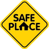 Yellow diamond-shaped sign with black text 'SAFE PLACE' and a house icon replacing the A in PLACE.
