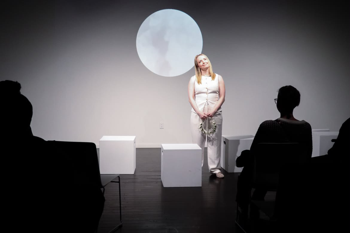 Gada Jane on stage in Becoming Psychic at Montréal Fringe 2026.