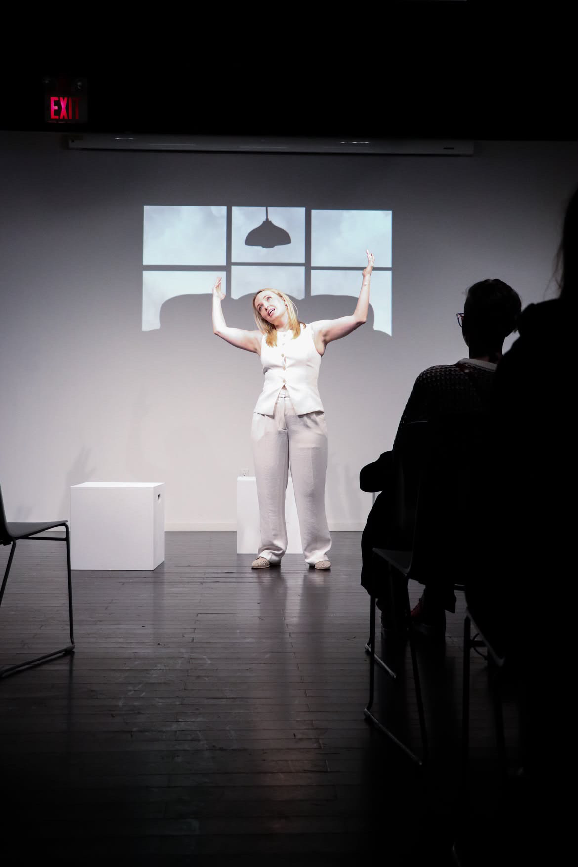 Gada Jane leads the audience through a short meditation in Becoming Psychic at Montréal Fringe 2026.