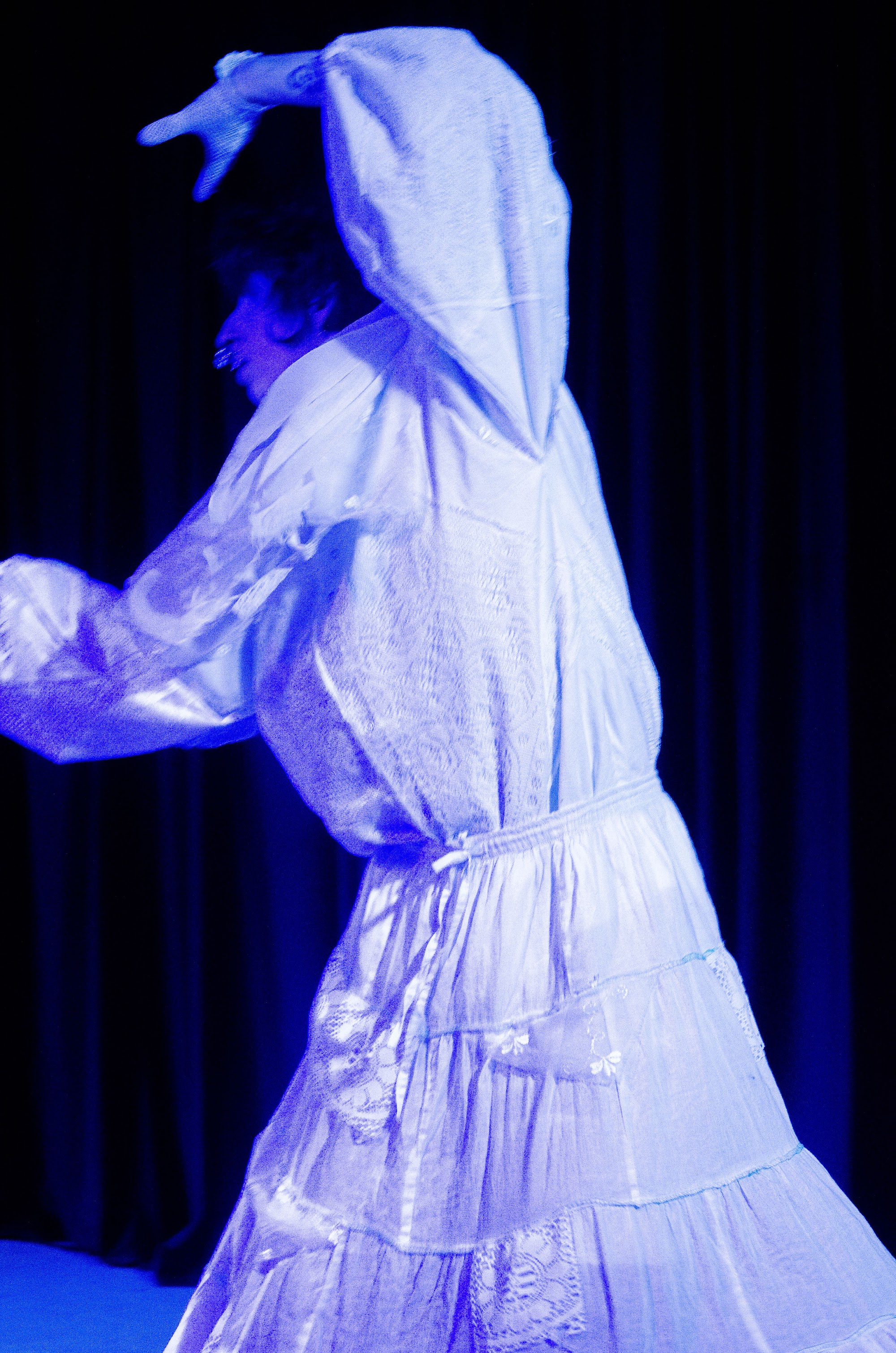 Marshall Kahente Diabo in the white gown of Dolycule at Montréal Fringe 2026.