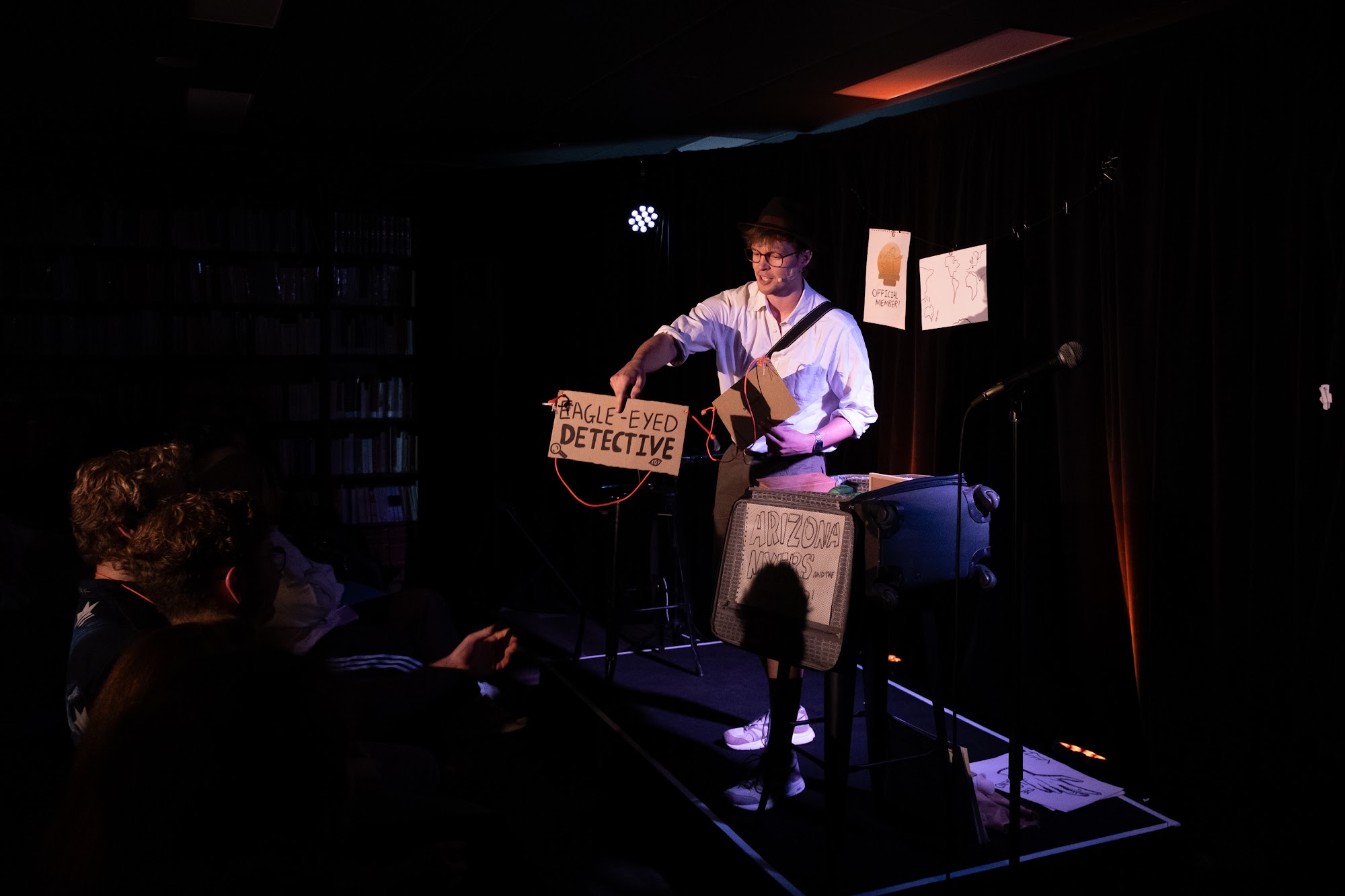 An audience member takes on the ‘Eagle-eyed Detective’ role in Arizona Myers and the Ominous Hand! at the Factory Theatre, Sydney Fringe 2026.
