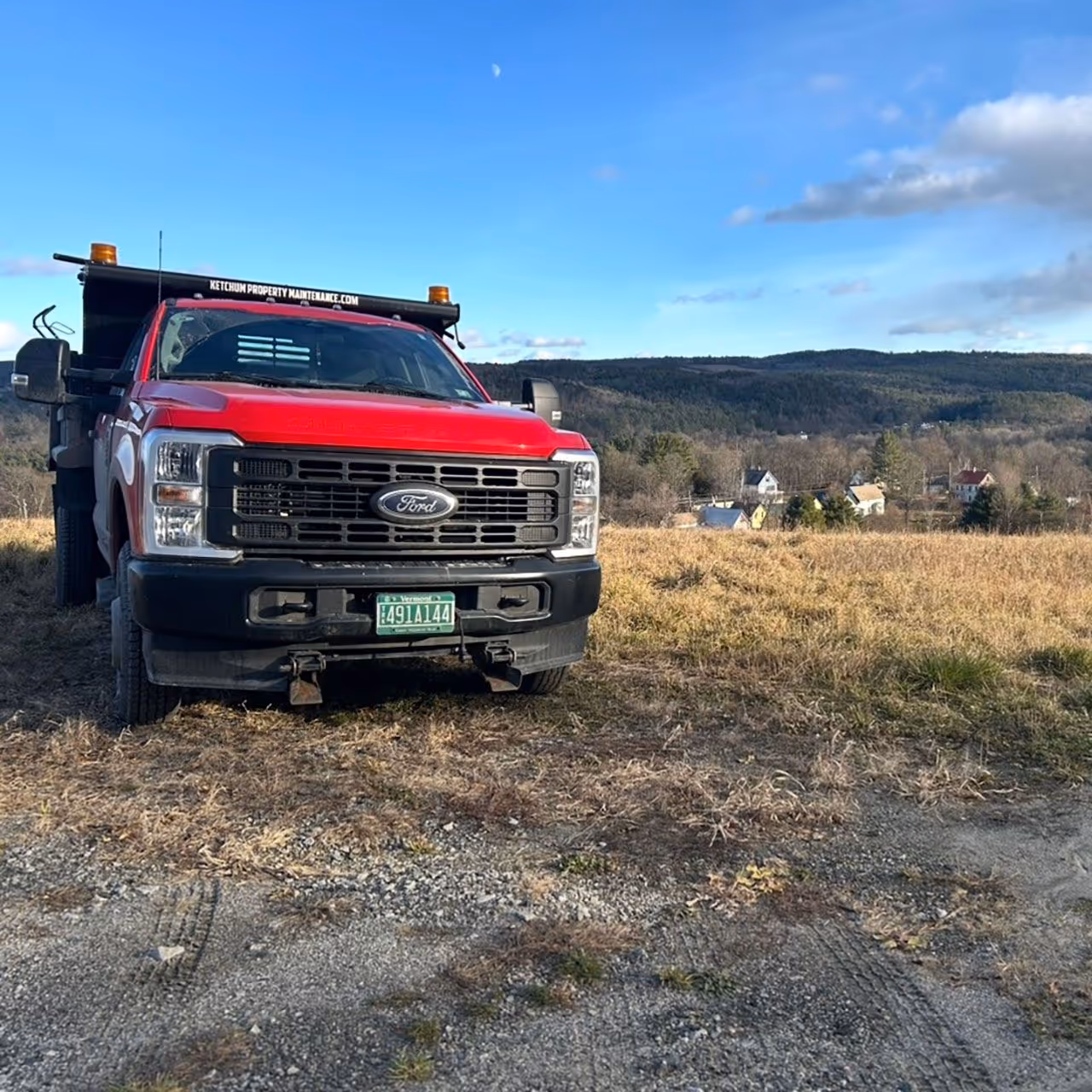 Ketchum Property Maintenance company truck in Randolph Vermont for lawn care and snow removal services
