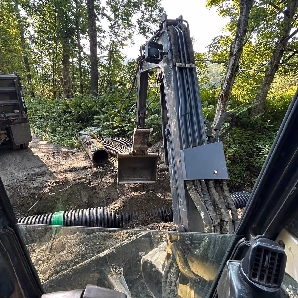 gravel driveway repair Randolph Vermont grading and leveling service