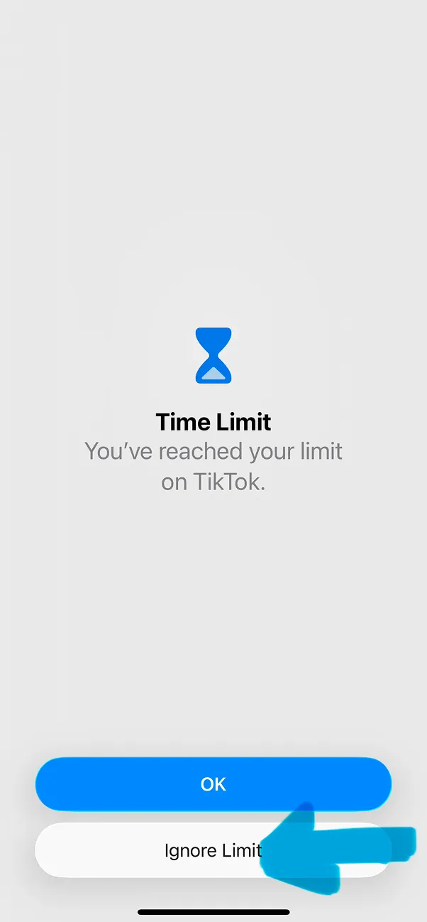 Time Limit reached notification screen displaying message "You've reached your limit on TikTok" with OK and Ignore Limit buttons
