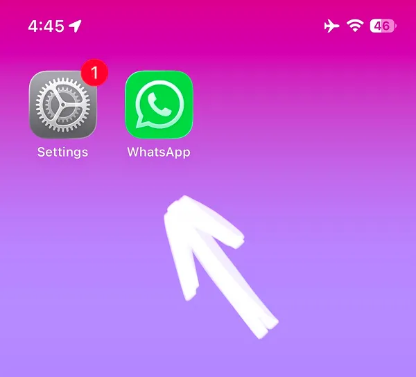 Home screen with Settings and WhatsApp app icons on gradient background