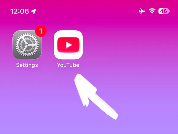 Settings and YouTube app icons on iPhone home screen
