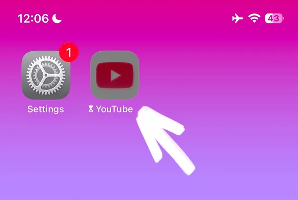 YouTube app icon grayed out on home screen showing it is blocked