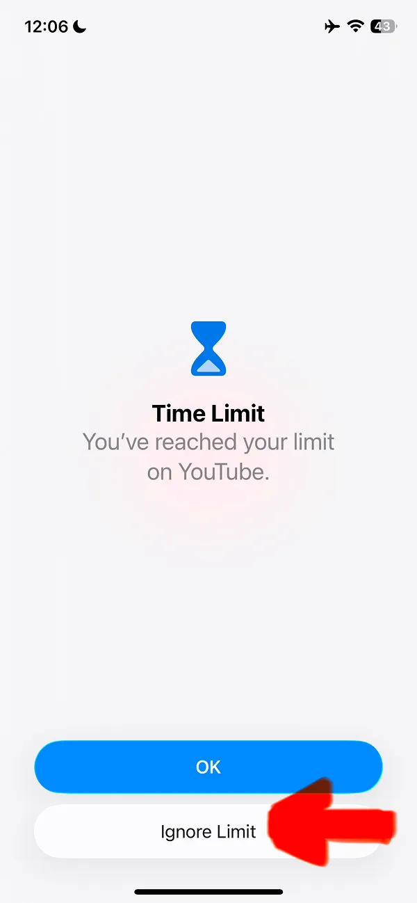 iOS Time Limit screen on YouTube with Ignore Limit button highlighted