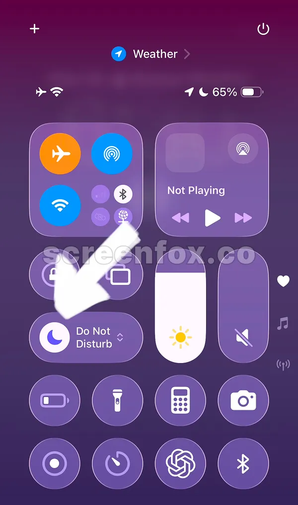 Control Center interface highlighting the moon icon button to turn off Do Not Disturb mode and resume normal notifications