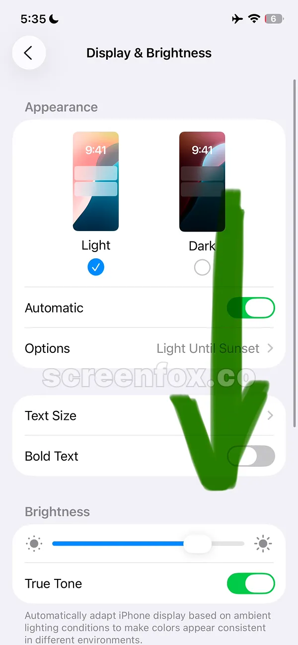 Scrolling down through Display & Brightness settings to find the Auto-Lock option