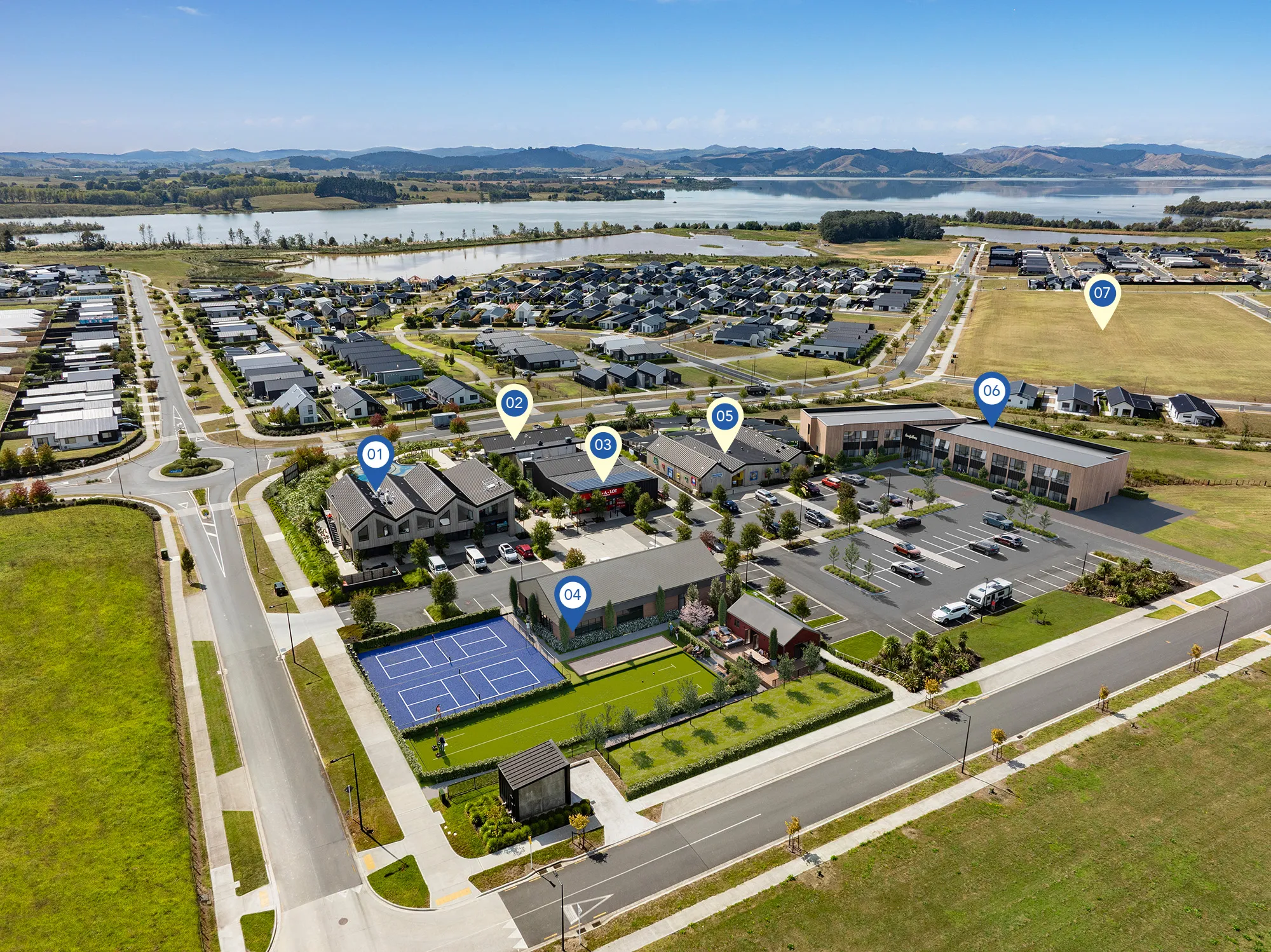 Aerial view of a residential neighborhood with numbered markers highlighting a residents' lounge, cafe, supermarket, community hub, childcare centre, primary school and potential future care facility.