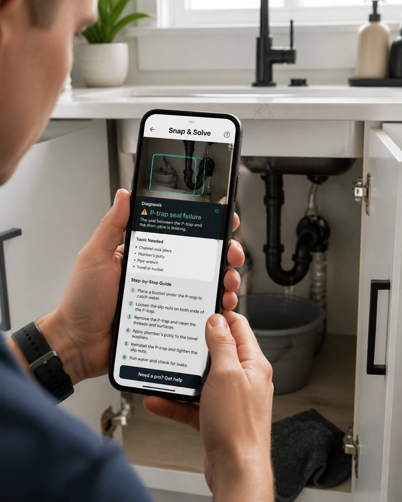 A person using the Snap & Solve feature to diagnose a leaking sink with AI step-by-step instructions.