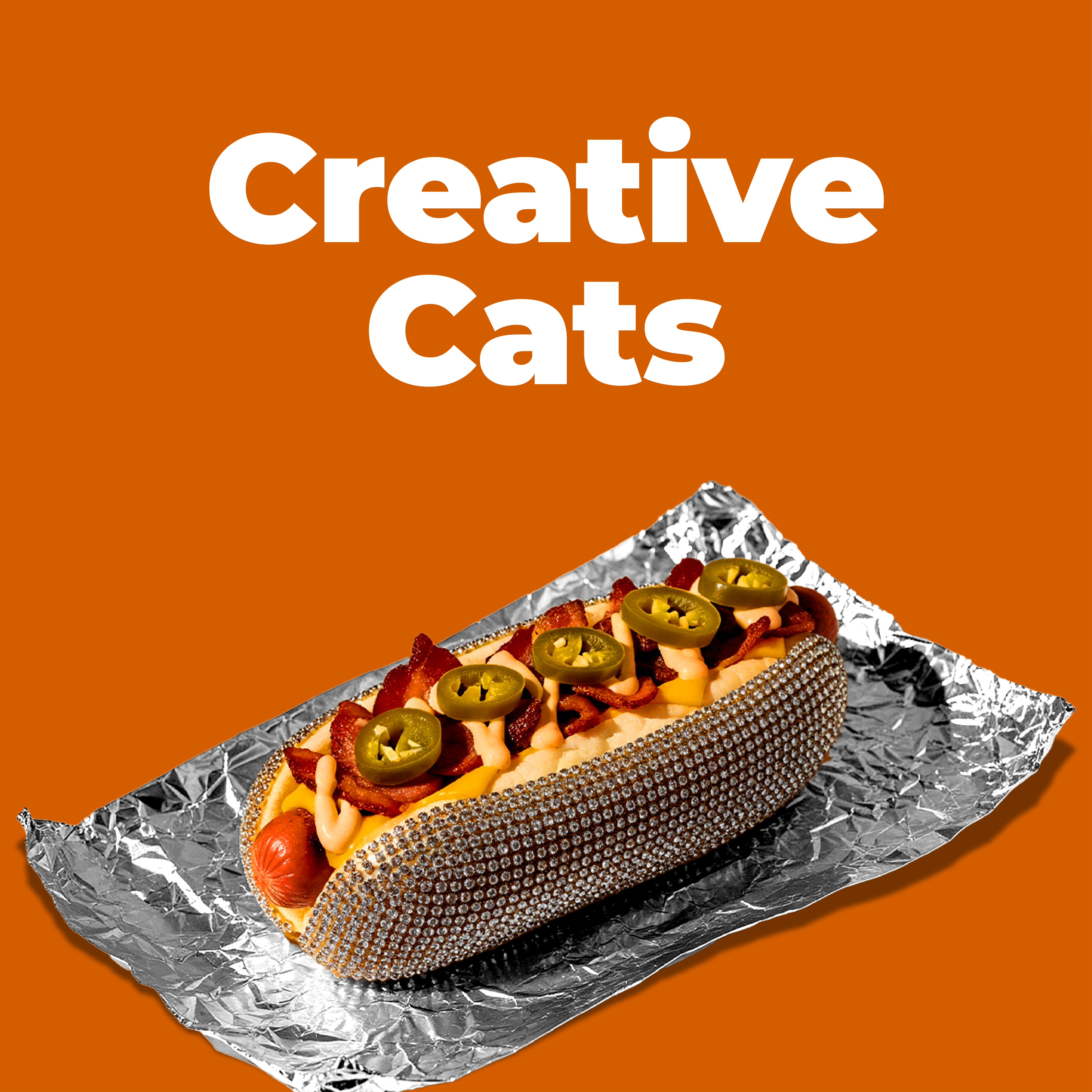 Creative Cats: loaded hot dog in a rhinestone-studded bun on foil