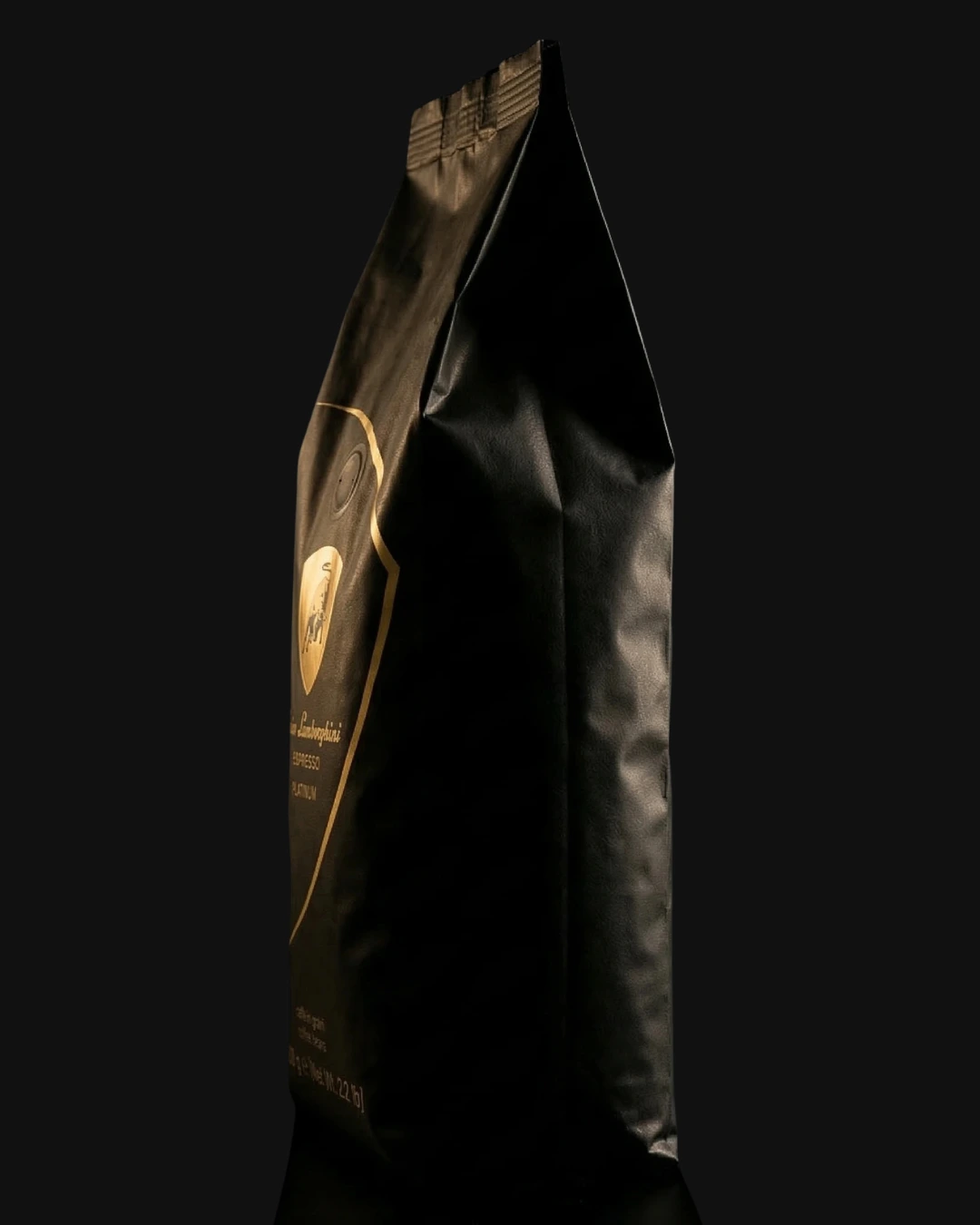 Black and white portrait of a woman with short curly hair looking confidently at the camera against a dark background.