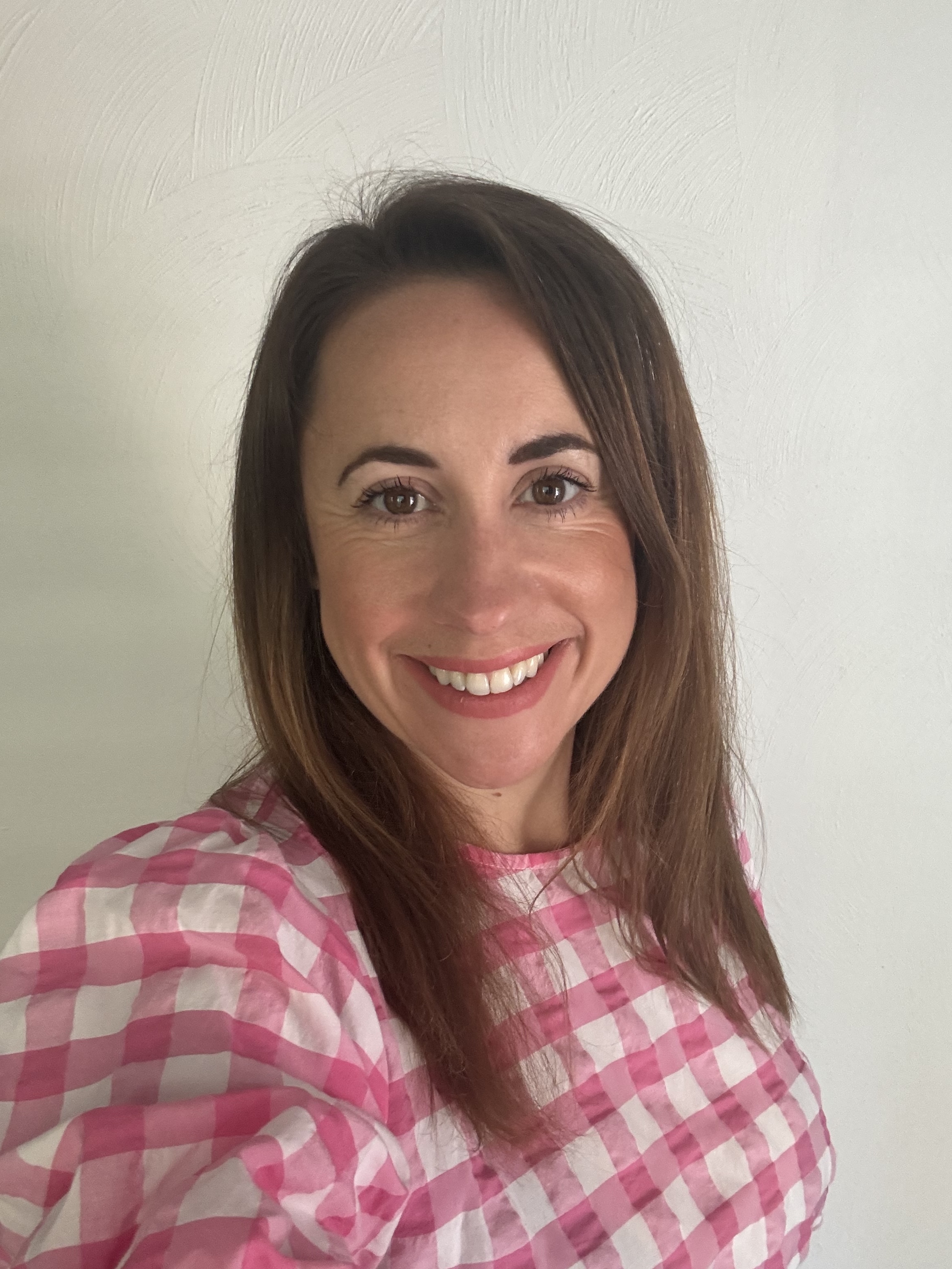 Jo, founder of Grow YOU Wellbeing, smiling warmly