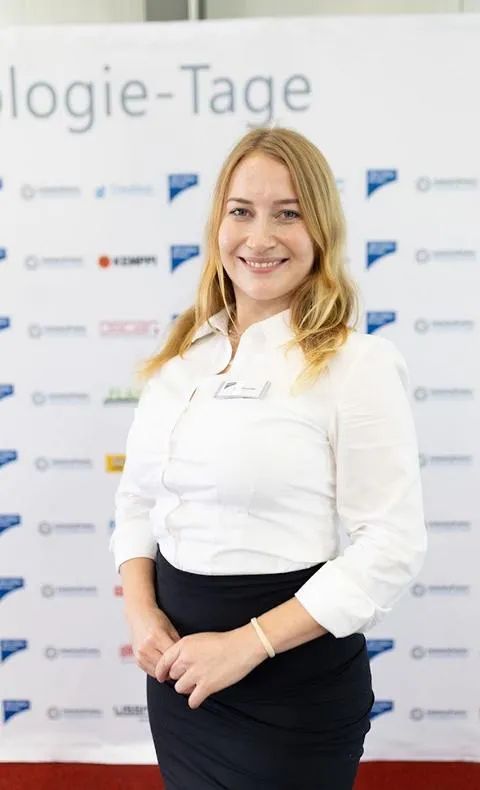 Professional event team at a corporate exhibition – hostesses and hosts by eventas