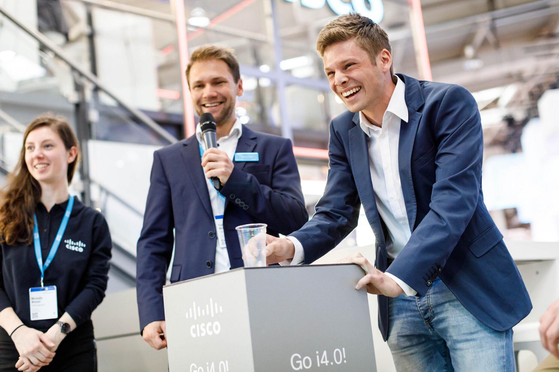 Tobias Witton hosts on stage for Cisco