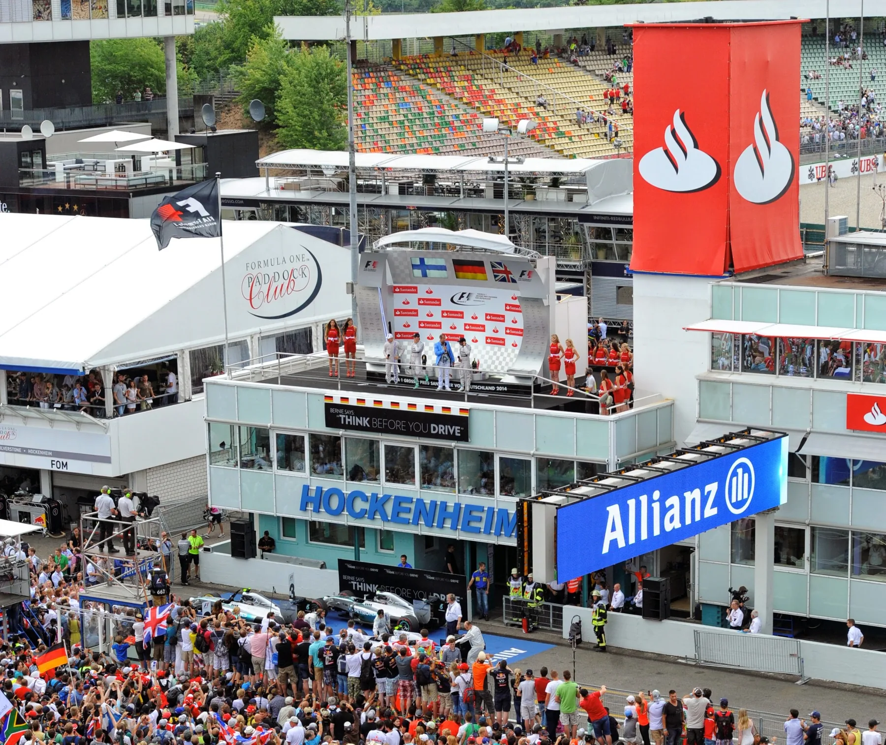View of the winners podium at the Hockenheimring with grid girls and Santander banners at the 2014 German Grand Prix