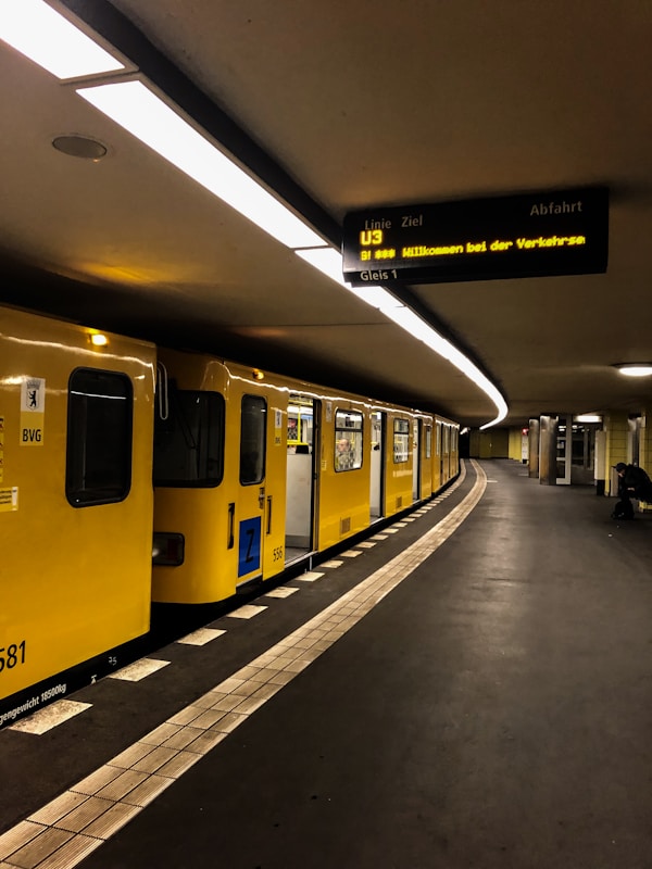 yellow train in the station