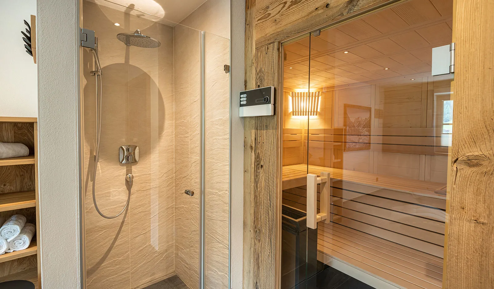 Chalet wellness area with wooden relaxation loungers beside a curtained window