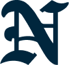 Dark blue decorative letter N with a pointed top flourish.