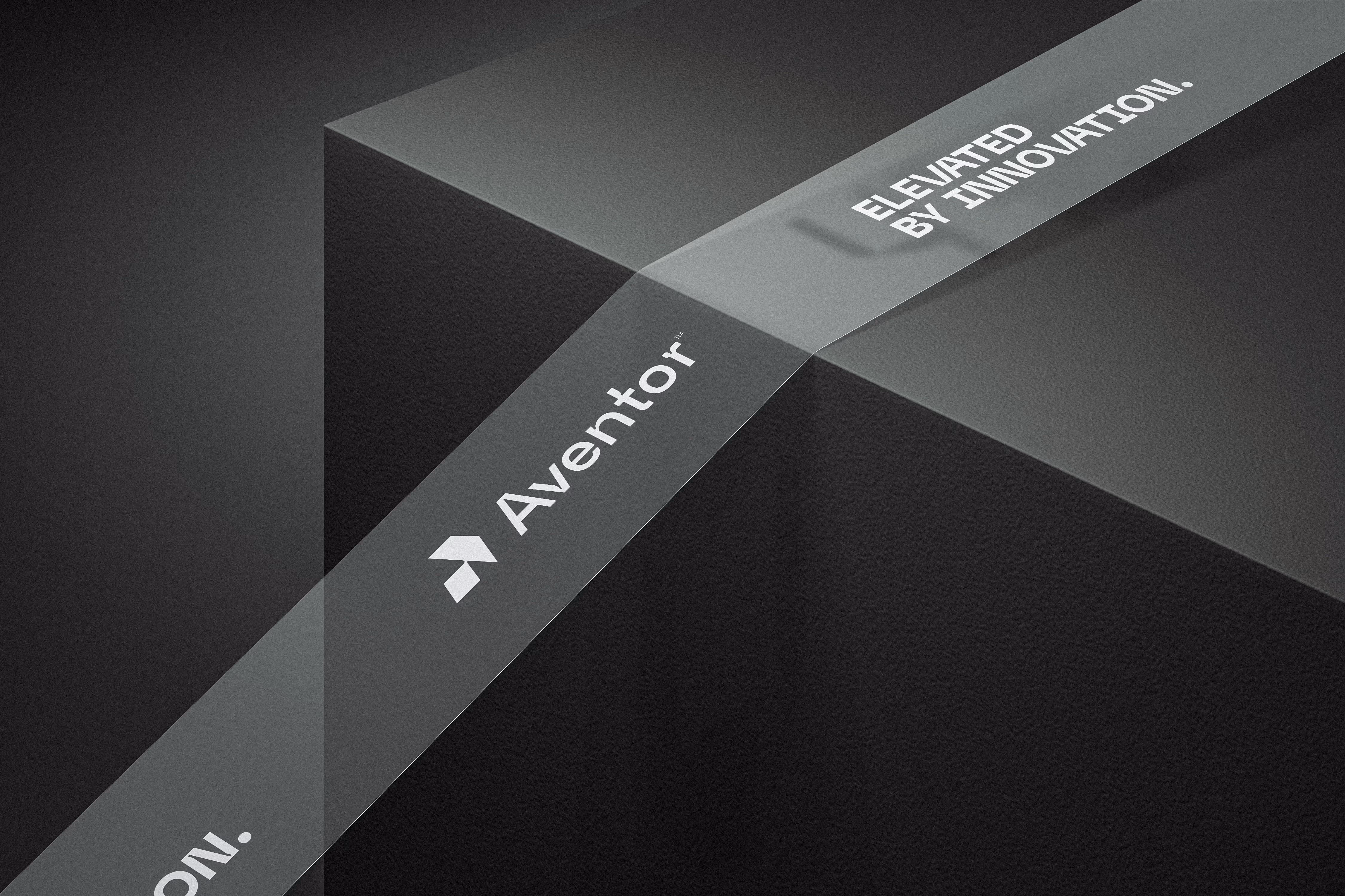 Transparent tape strip on dark textured surfaces with text 'Aventor' and 'Elevated by Innovation.'