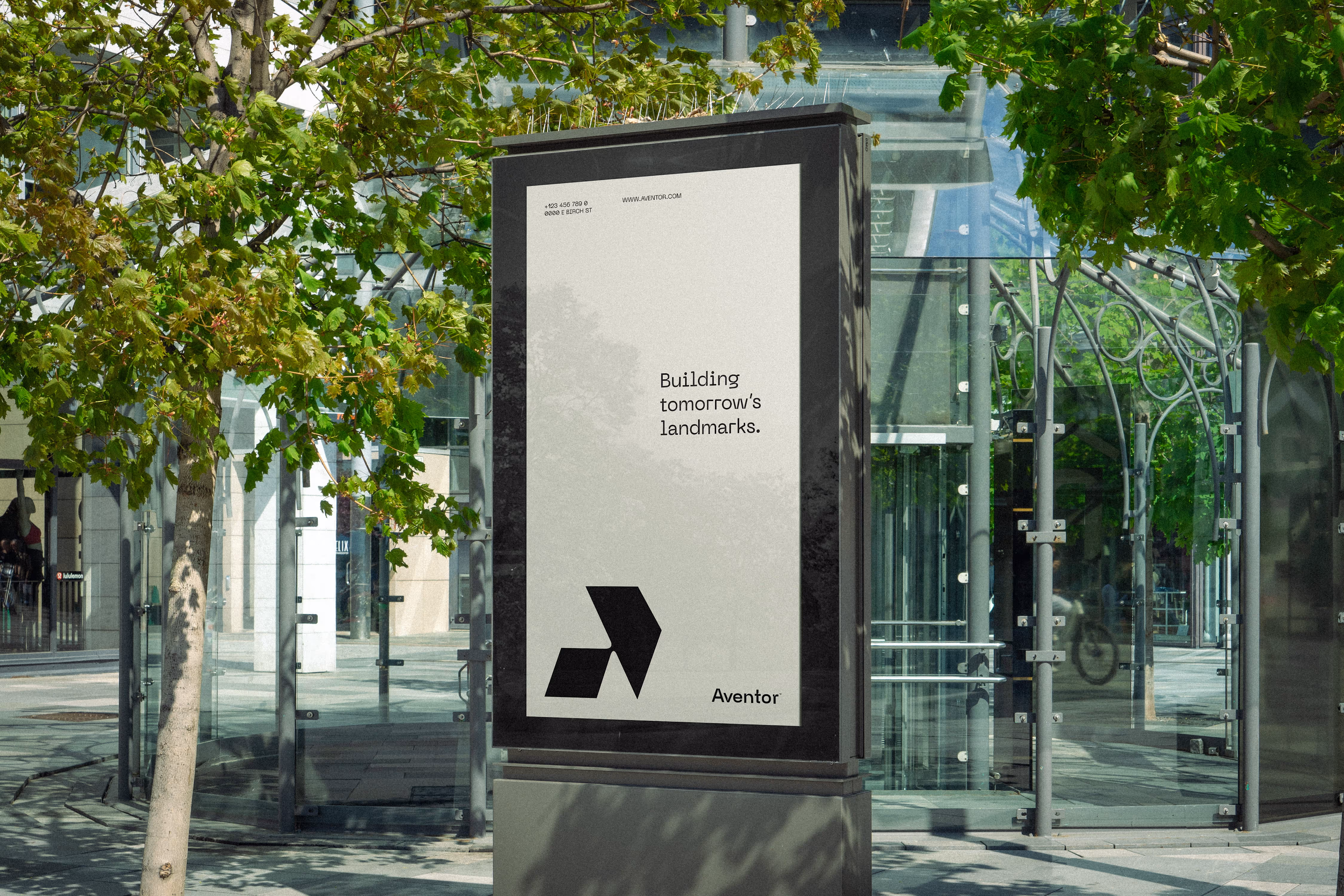 City lightbox billboard with the text 'Building tomorrow’s landmarks' and Aventor logo.