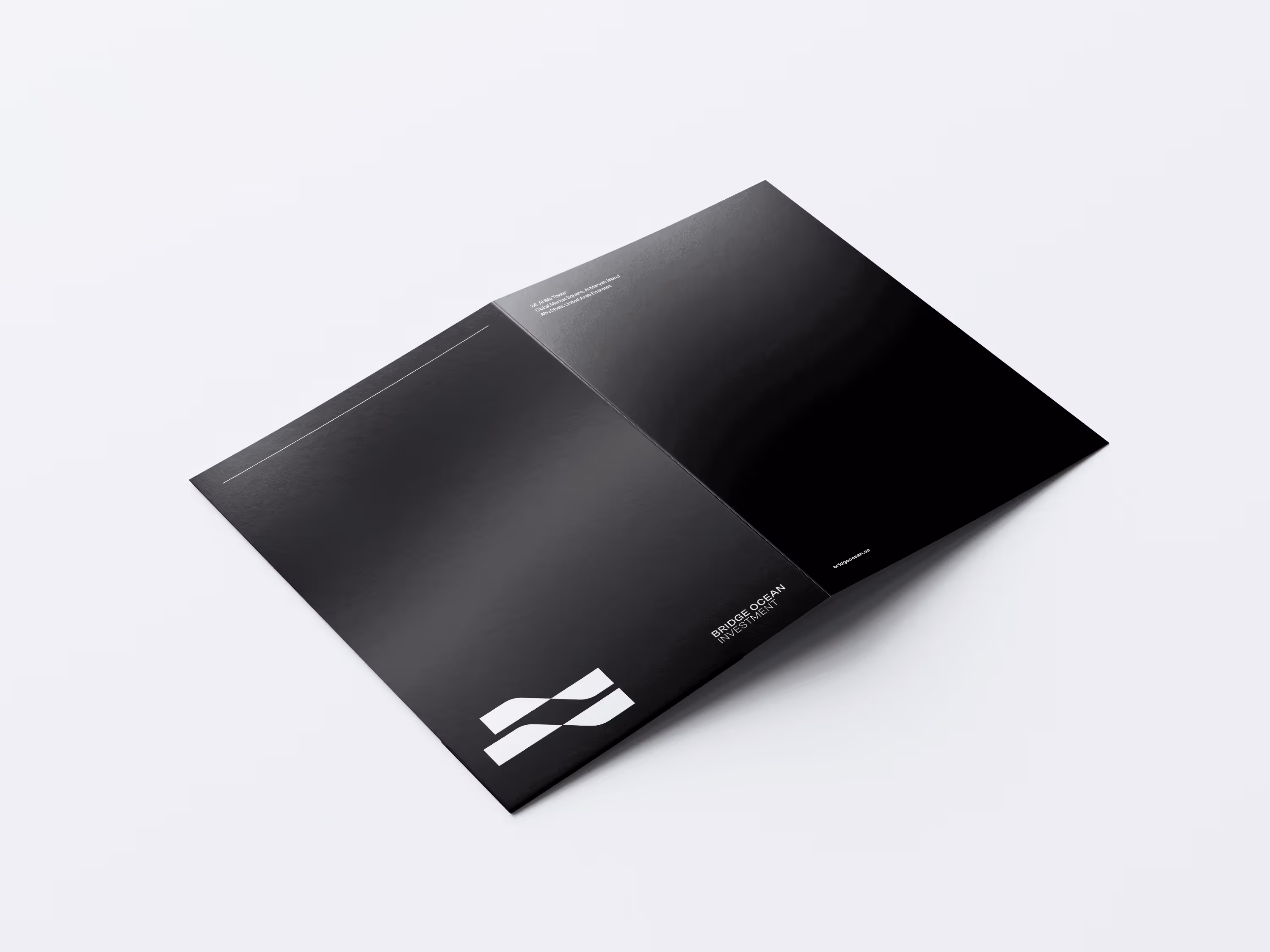 Open black tri-fold brochure with white logo and text on white surface.
