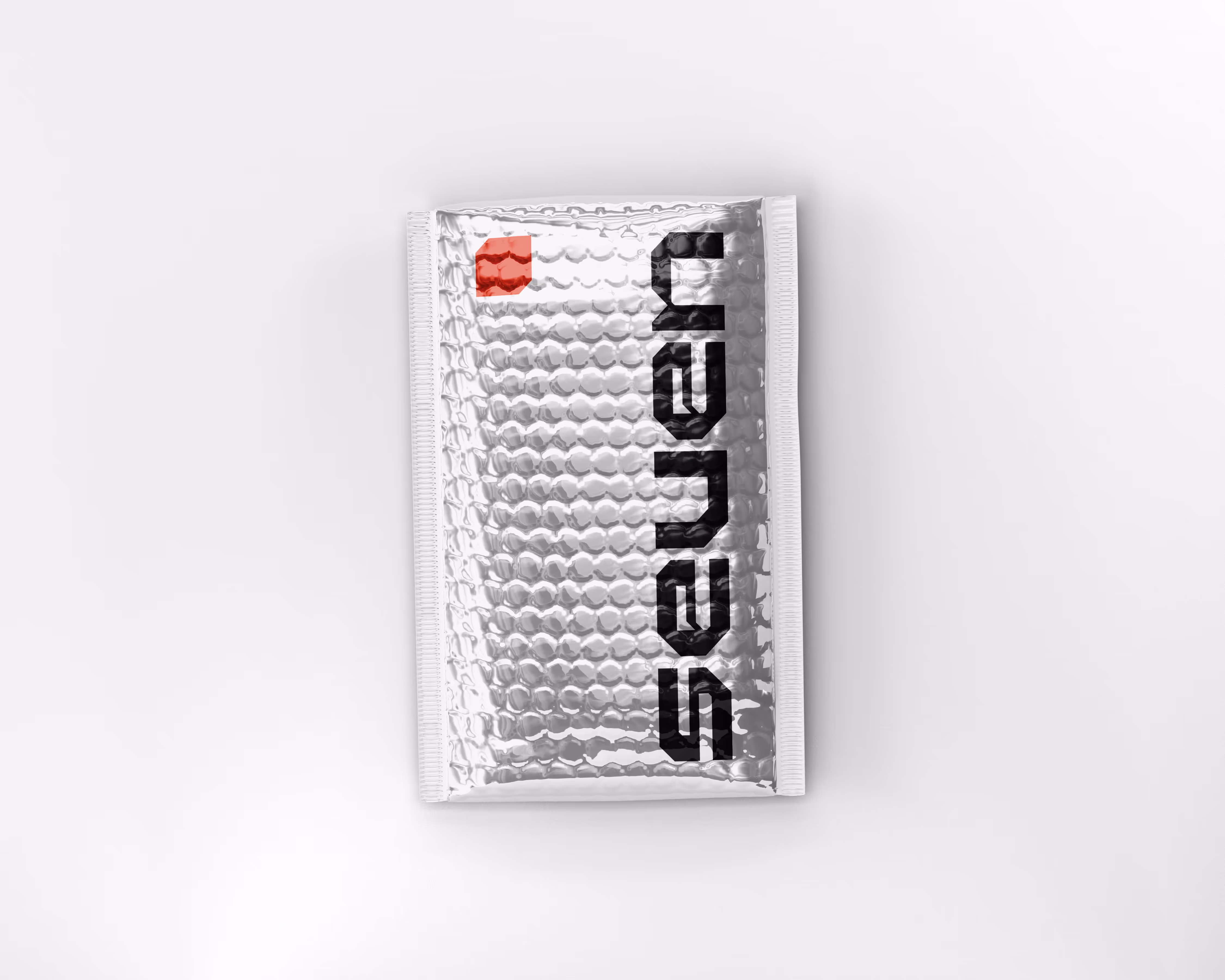 Silver metallic bubble mailer with black text and a small red square on a white background.