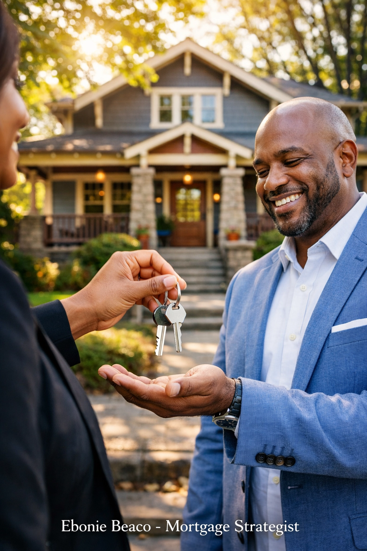 Real estate investor receiving keys to a renovated Atlanta investment property after a successful closing.
