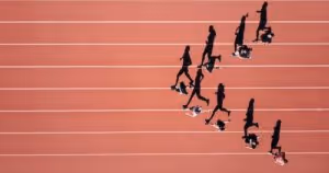 Group of runners sprinting together
