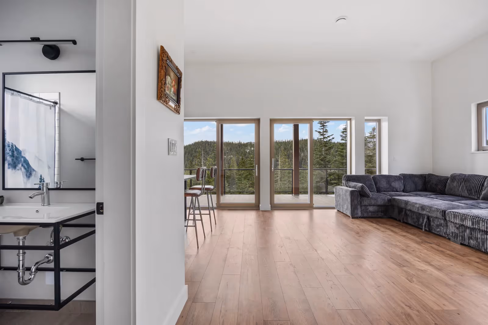 Interior details of Fjellheim showing tongue and groove log precision and modern mountain home aesthetic
