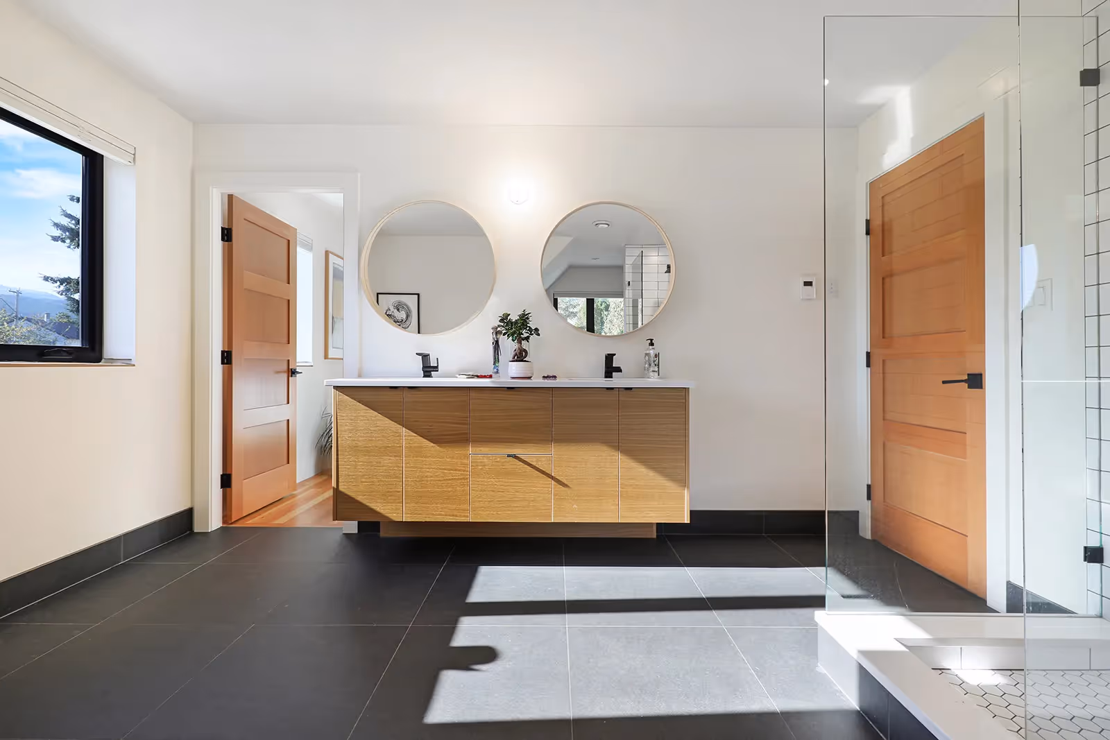 Custom bathroom with polished concrete floor in Rustic Retreat Cumberland home