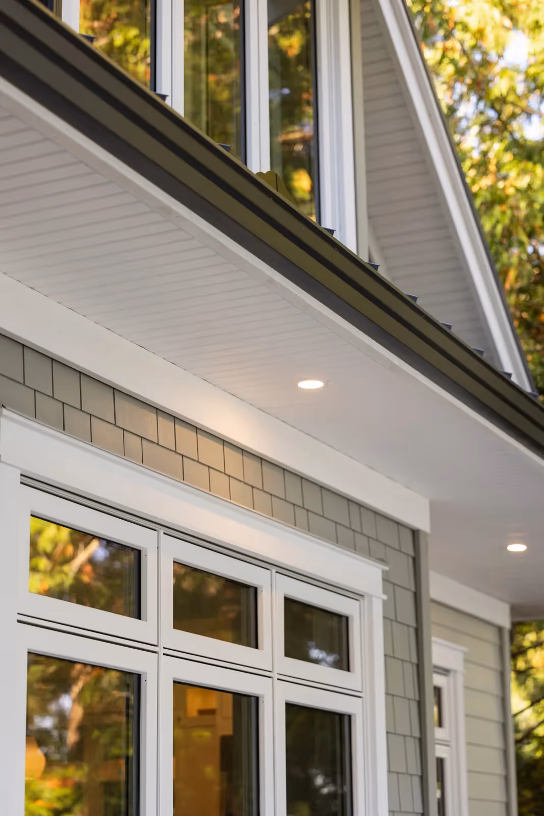West coast craftsman exterior architecture of Misty Bluff with warm wood accents and landscaped entry