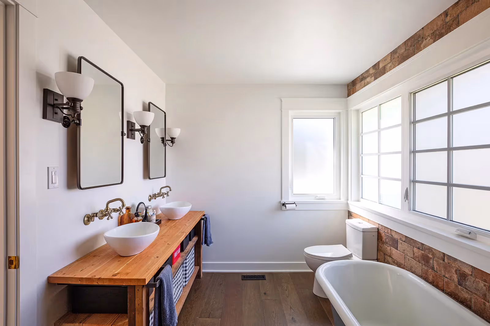 Artisanal craftmanship bathroom in Cumberland Cottage with handmade tile and vintage fixtures