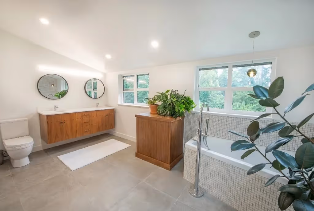 Spacious wet room bathroom in Garden of Eden renovation with custom tile work and west coast contemporary design