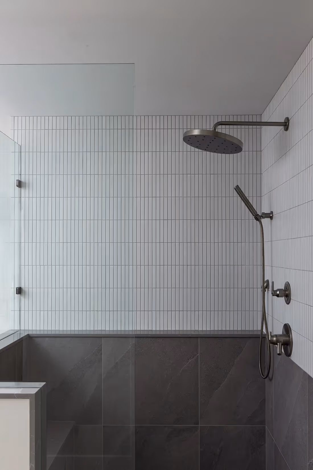 Custom tiled walk-in shower in The Second Act with organic finishes and spa-inspired design