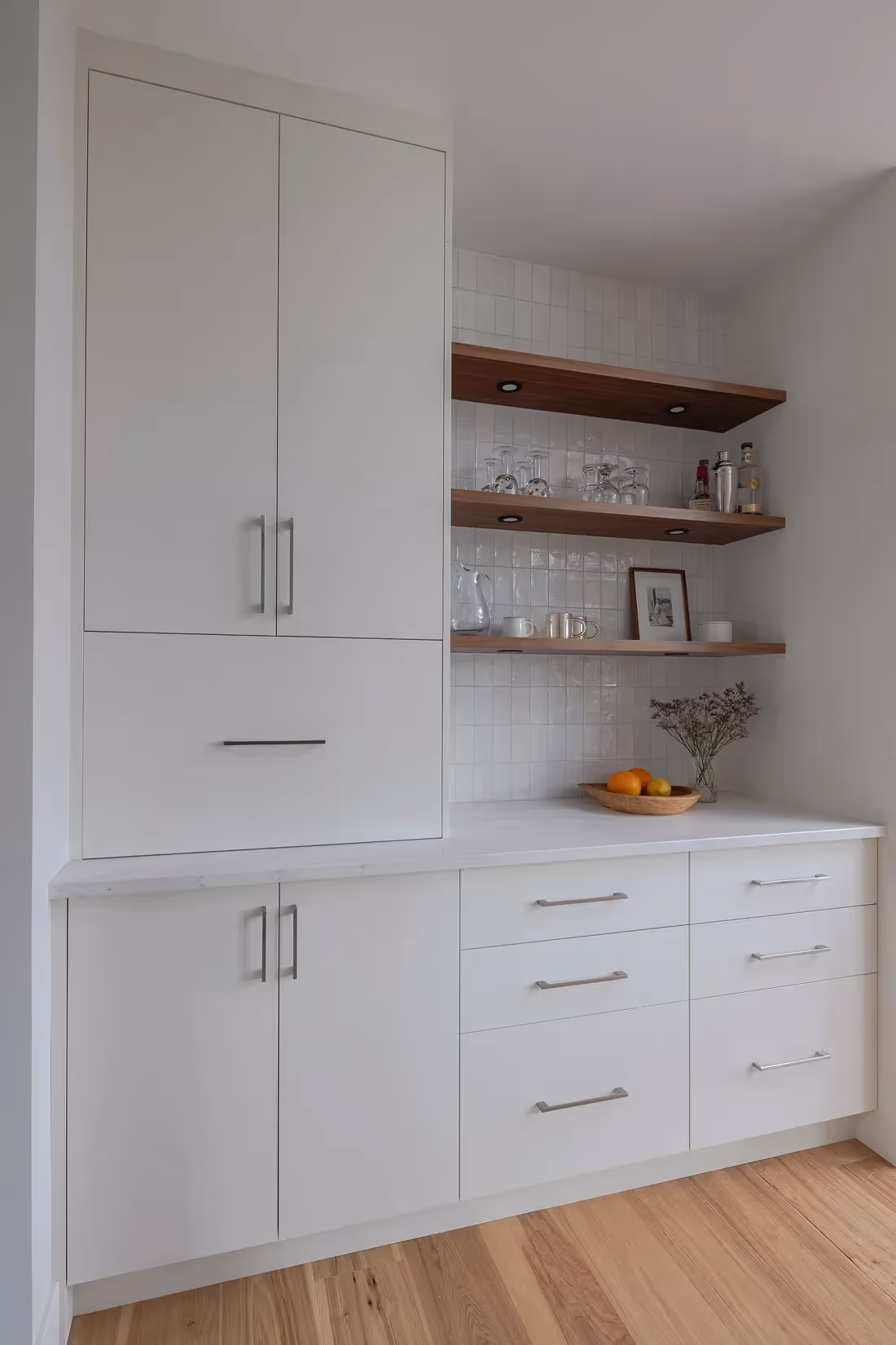 Refined built-in cabinets with clean lines and minimalist styling in The Second Act Comox home