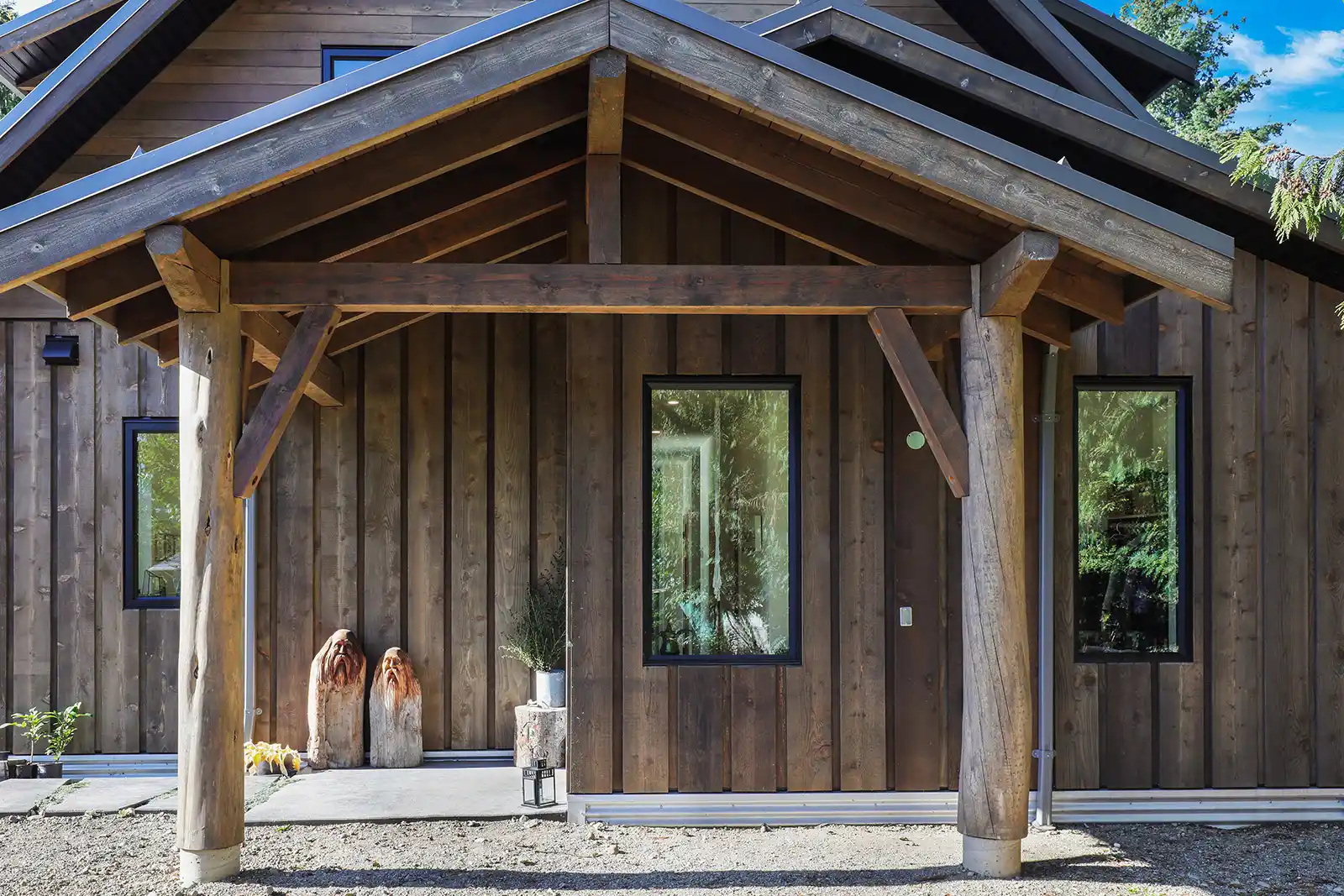 Shou sugi ban stair treads and custom wood cabinetry in Rustic Retreat Cumberland home