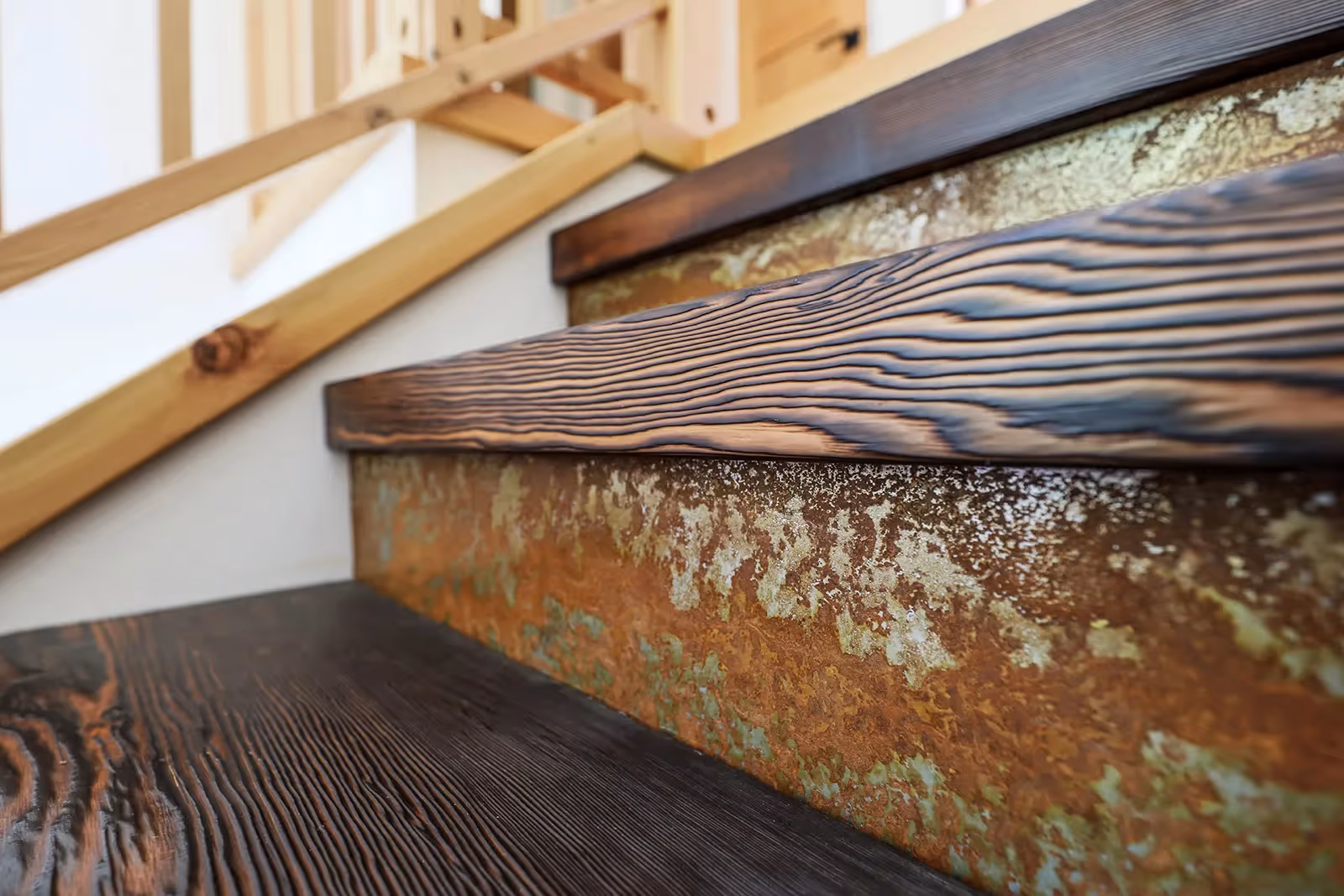 Custom wood cabinetry and open-concept kitchen in Rustic Retreat with modern rustic finishes throughout