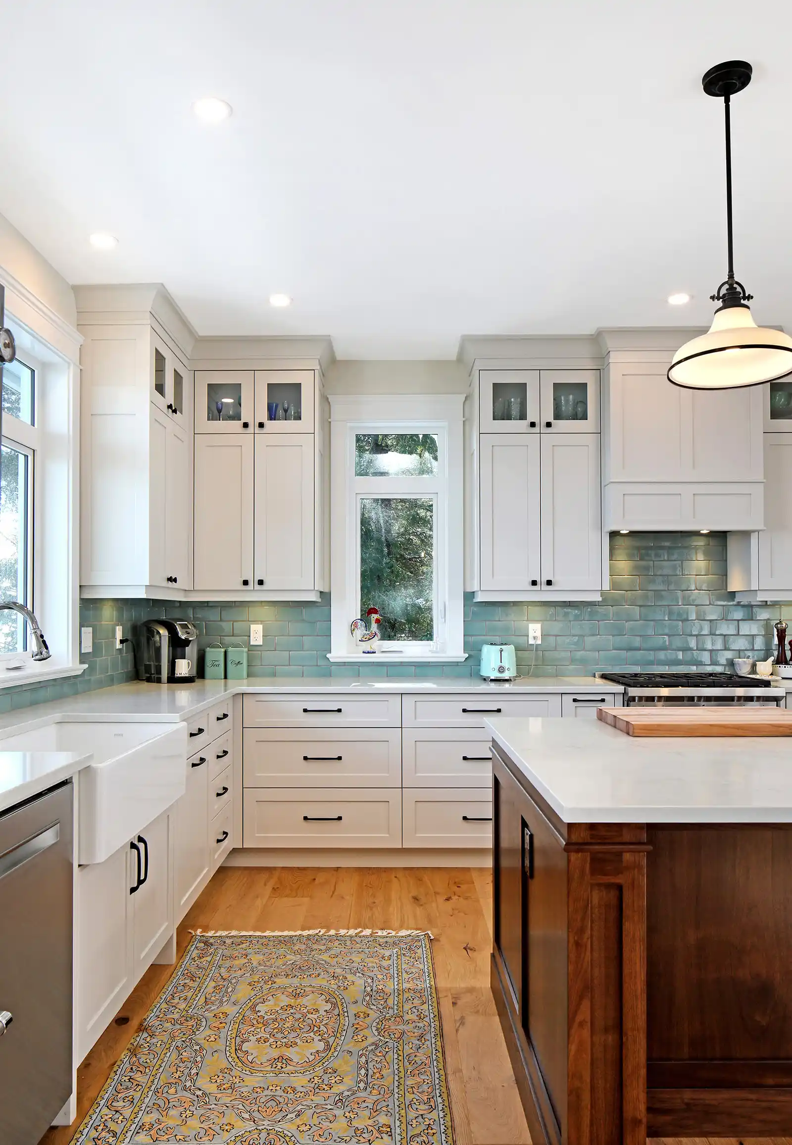 Walk-in pantry with live edge counters and organized open shelving in Seabank Cottage kitchen