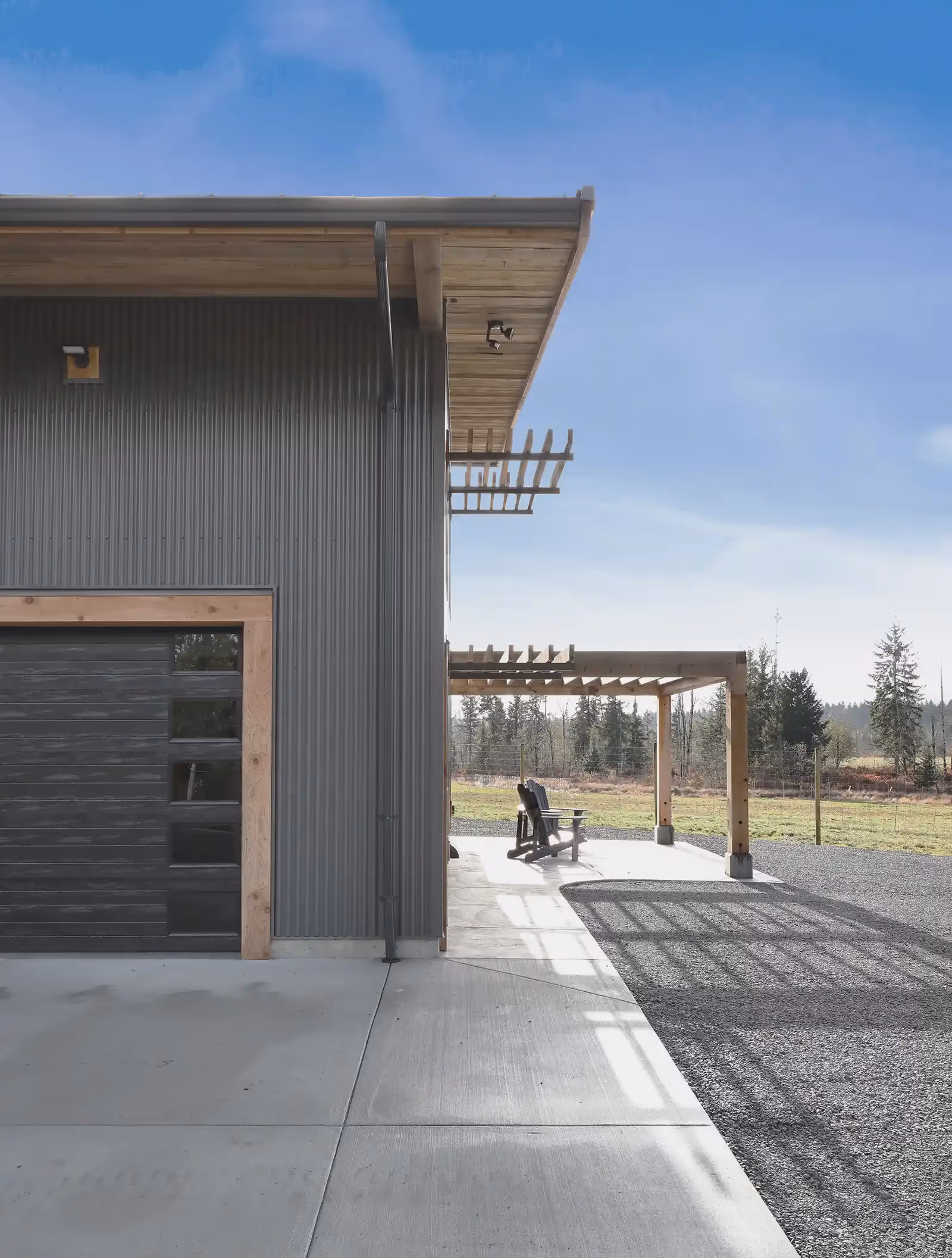 Exterior covered parking and shade fins at Asgard Farm workshop in Black Creek BC