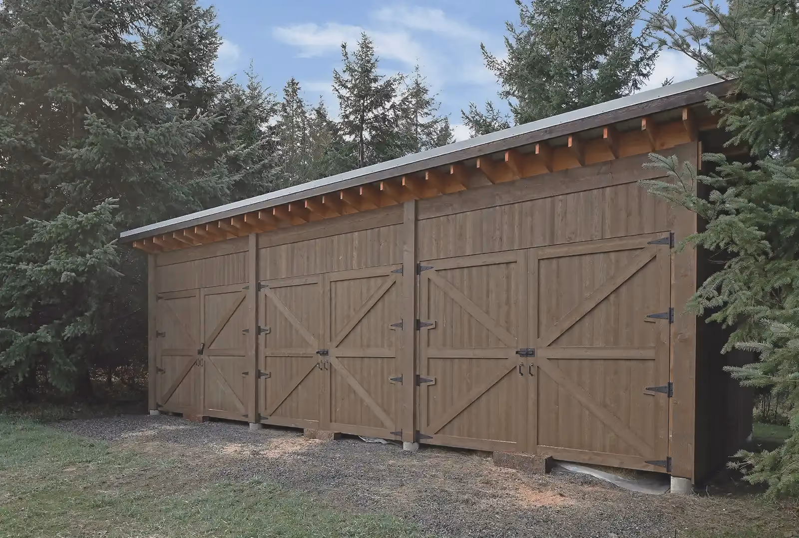Detail view of Sparrow Grass Farm modern barn showing precision barn doors and high-performance agricultural construction