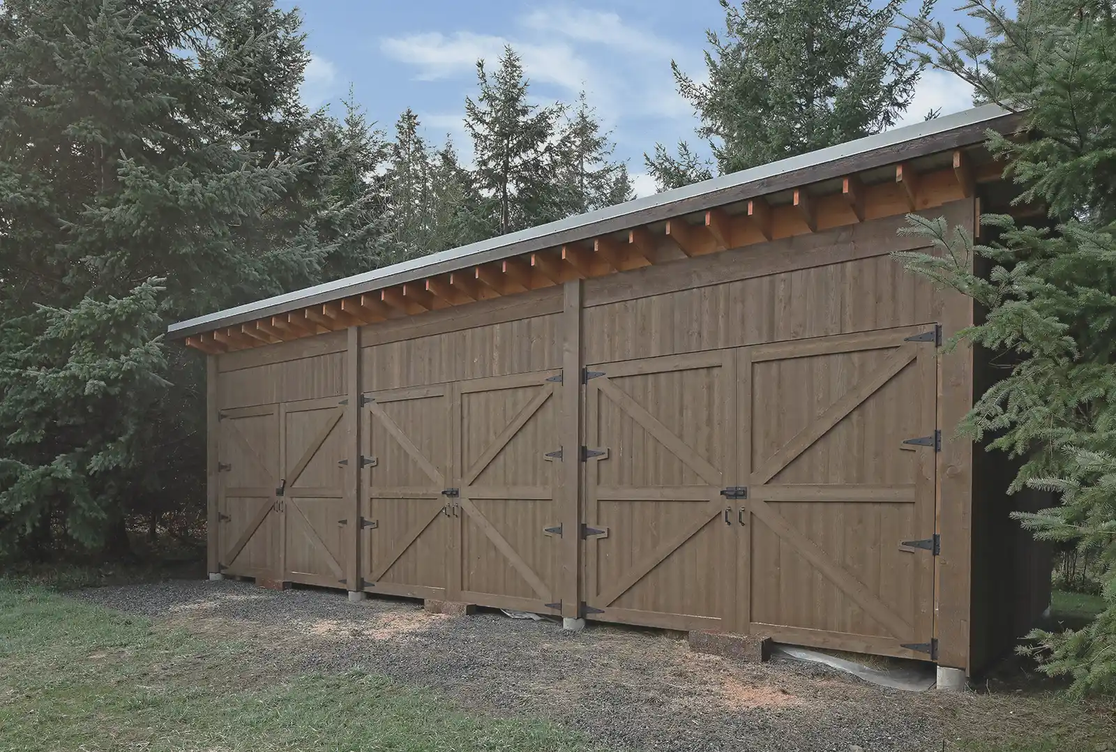 Detail view of Sparrow Grass Farm modern barn showing precision barn doors and high-performance agricultural construction