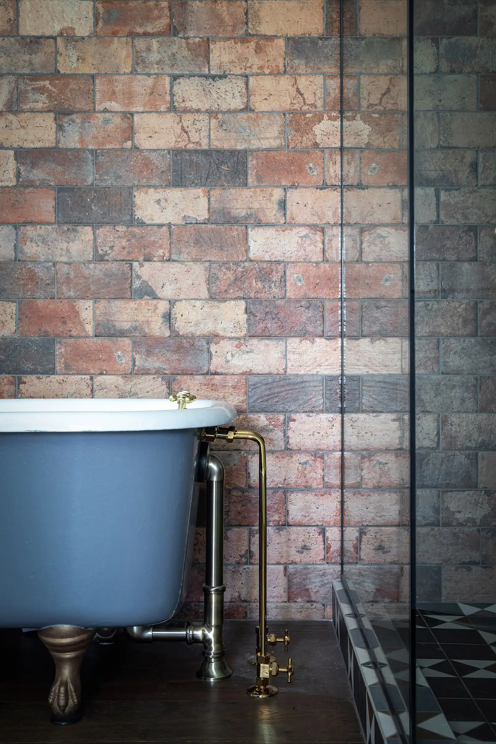 Warm interior detail of Cumberland Cottage with reclaimed furniture piece integrated into eclectic farmhouse design