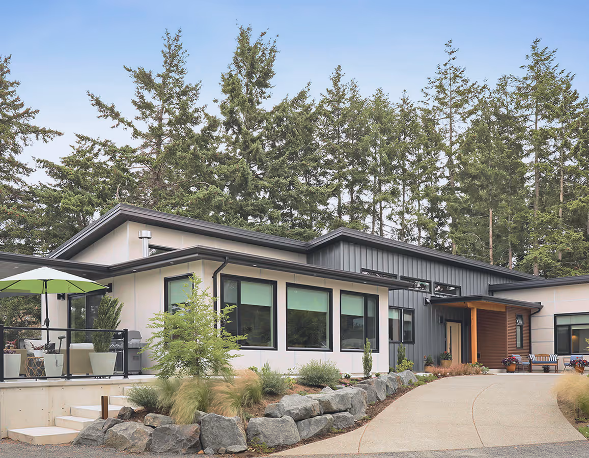 Little River Landing architect-designed custom home exterior with clean lines, expansive windows, and thoughtful landscaping