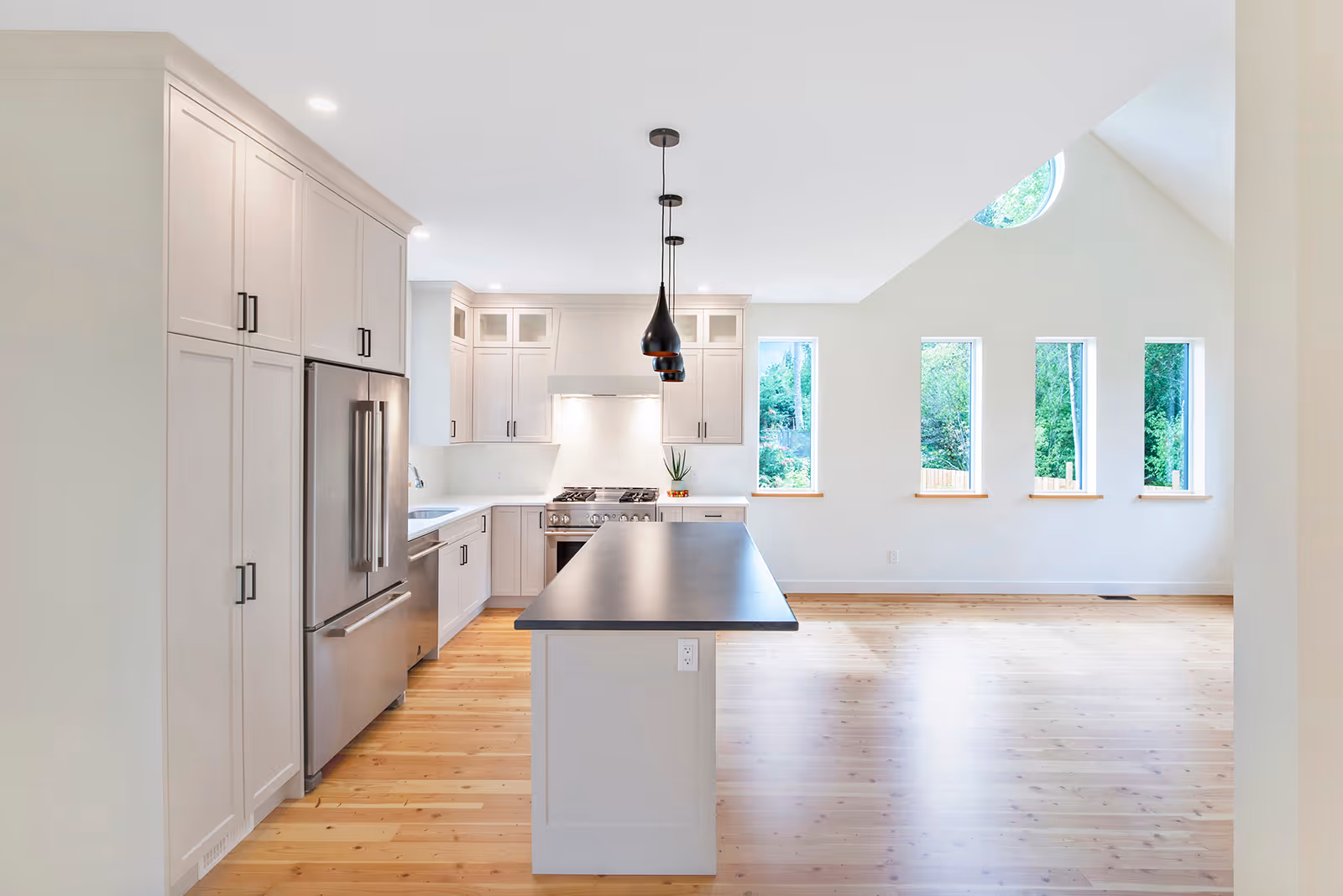 Minimalist white kitchen interior in White Castle home with clean lines and bright natural light