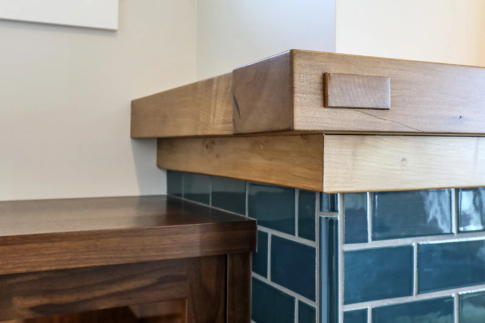 Built-in cabinetry and pantry storage in Seabank Cottage with live edge counters and craftsman details