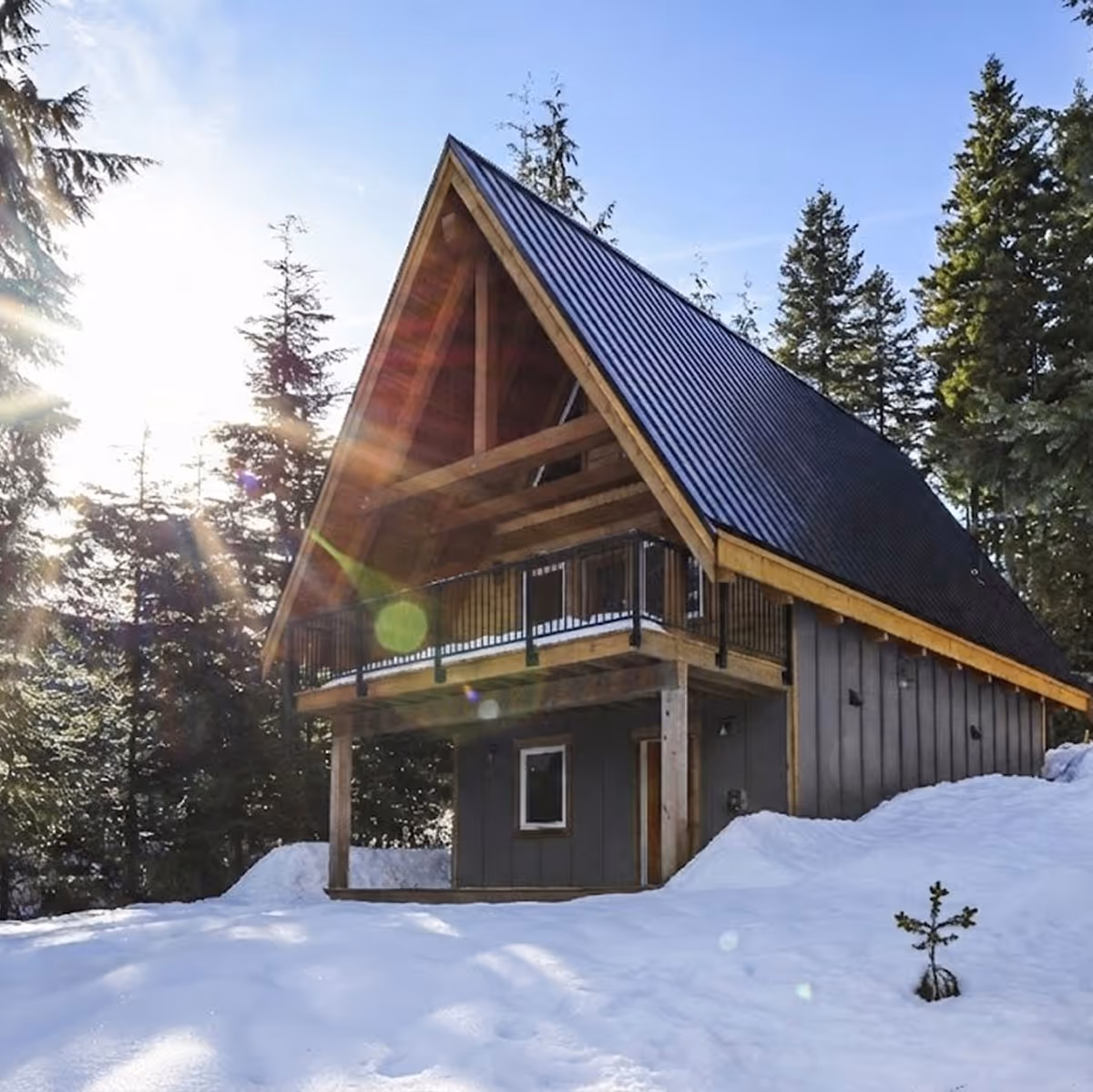 Sunrise over the A Plus custom A-frame cabin at Forbidden Plateau, Comox Valley