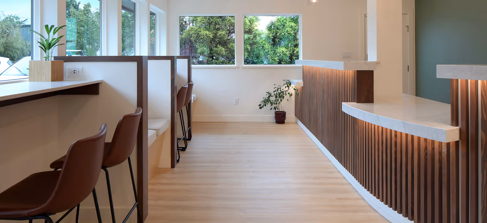 Entrance lobby of Westward Medical Clinic with warm lighting and welcoming biophilic design